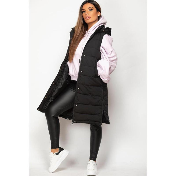 Schwarzes Wattiertes Longline-Kapuzenjacke für Komfort im Winter