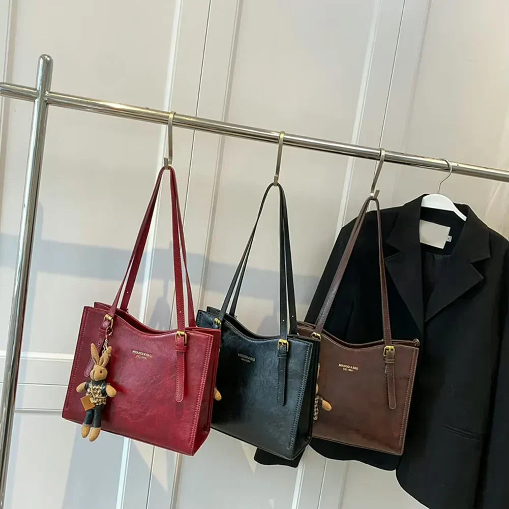 NIKKI™ - Elegante Schultertasche