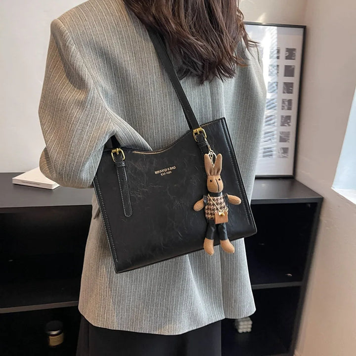 NIKKI™ - Elegante Schultertasche